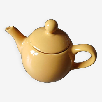 Ocher yellow teapot