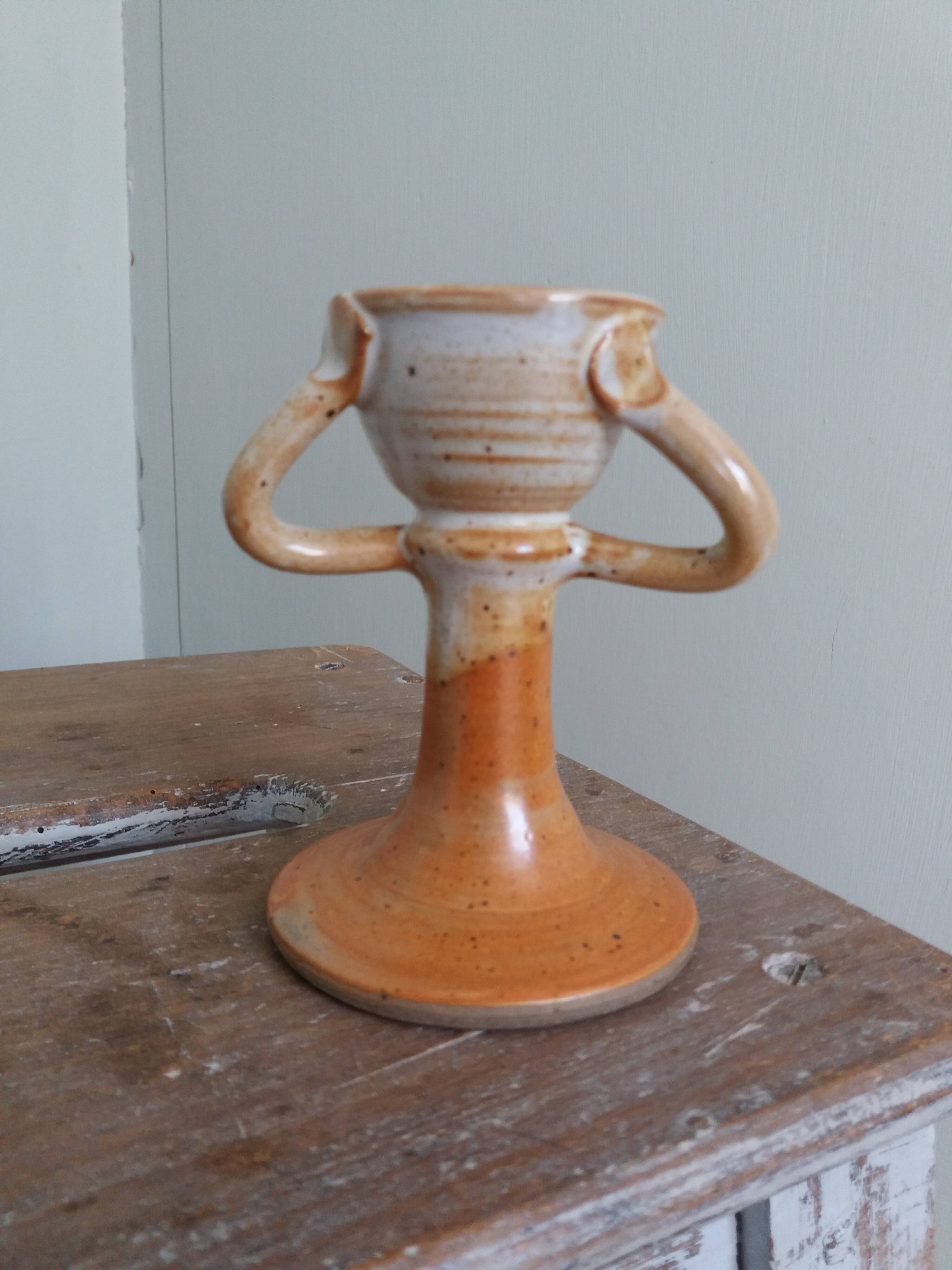 Anthropomorphic sandstone egg cup signed GL