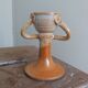 Anthropomorphic sandstone egg cup signed GL