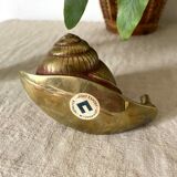 Golden brass snail