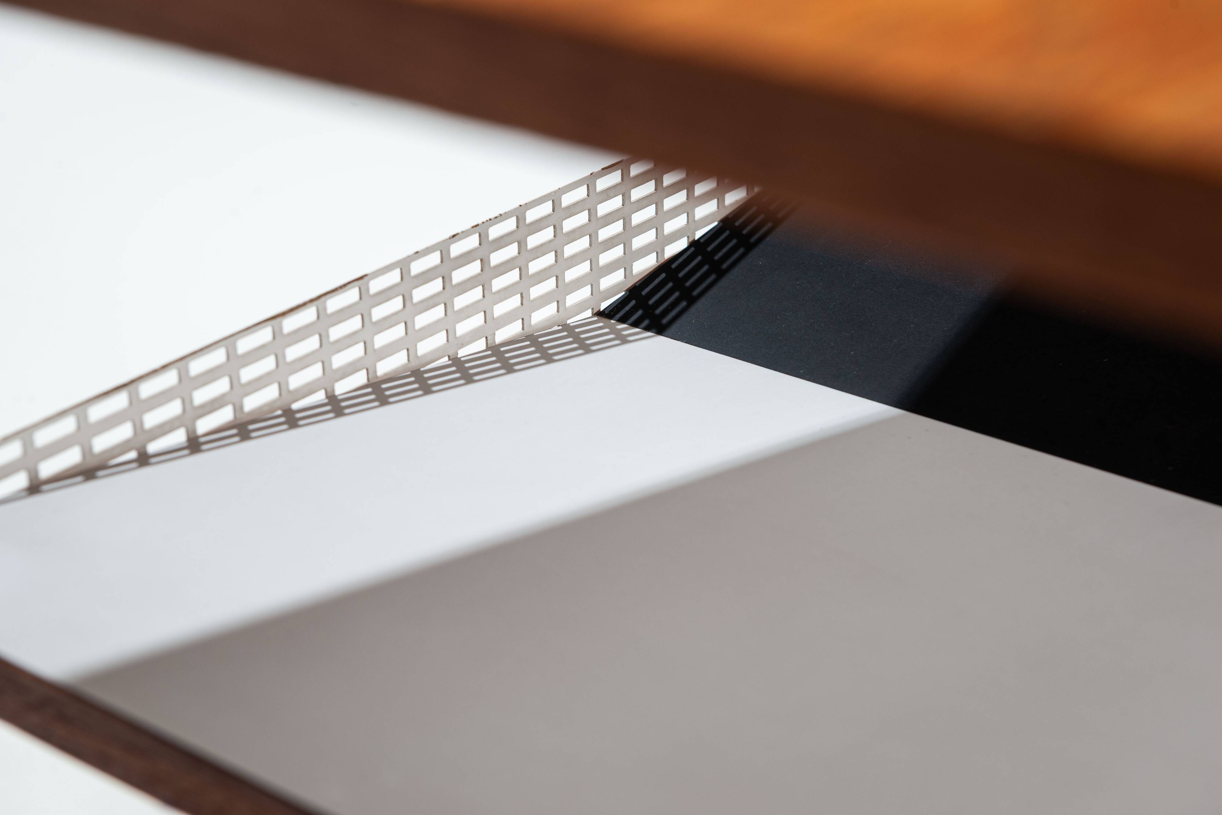 Sidetable with teak top and black and white storage shelves