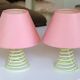 Pair of lamps, yellow spring foot, pink lampshade, 90s