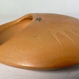 Ceramic pocket emptier
