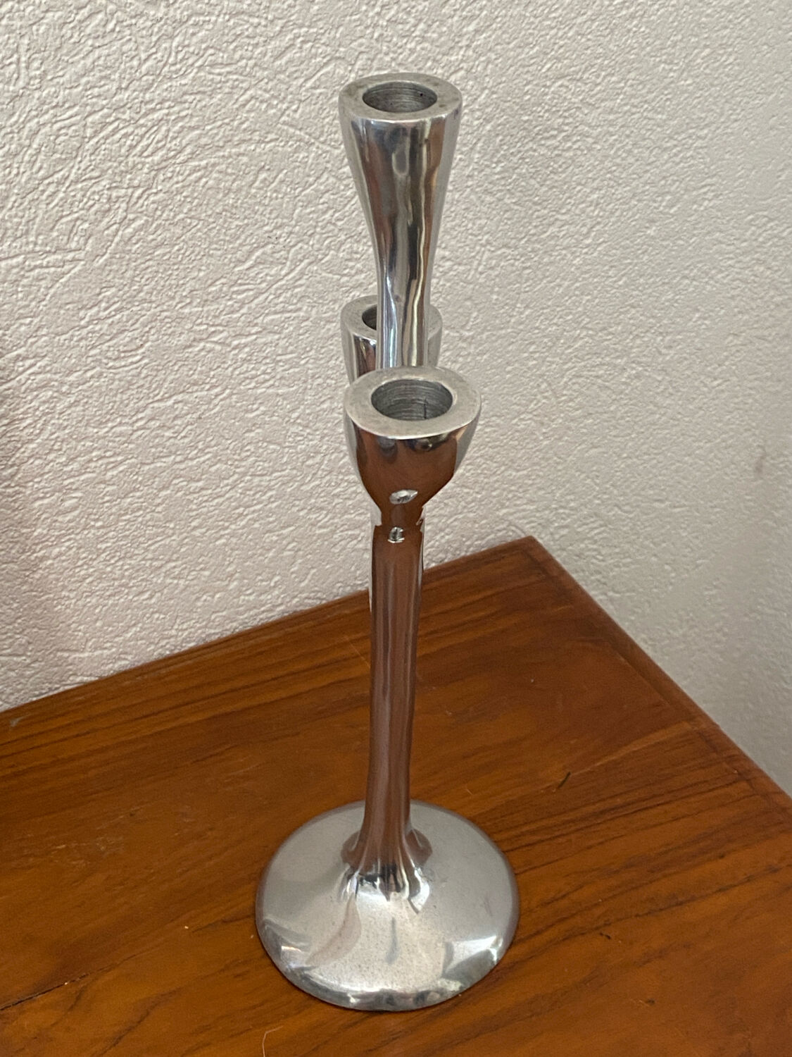 Organic-shaped cast aluminium candlestick