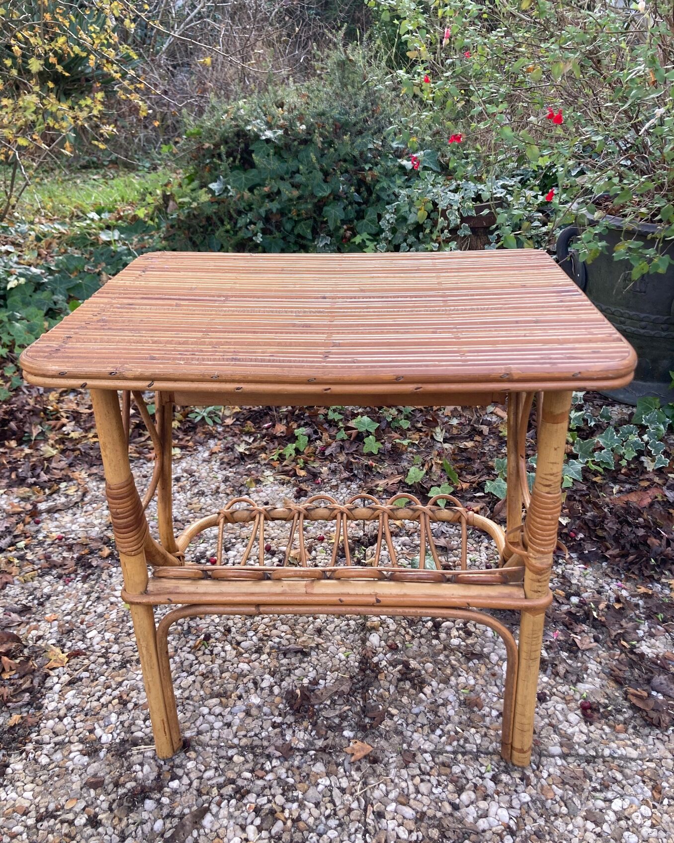Vintage rattan magazine rack table