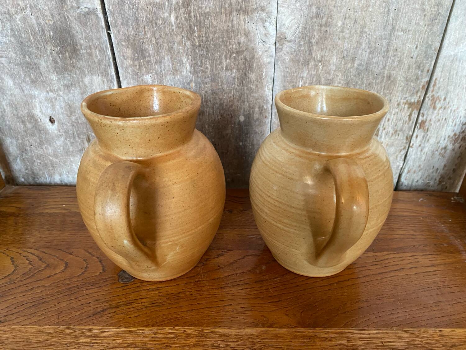 Pair antique cnp village beige & cream stoneware pitchers vintage
