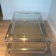 Table basse à double plateau en chrome et laiton