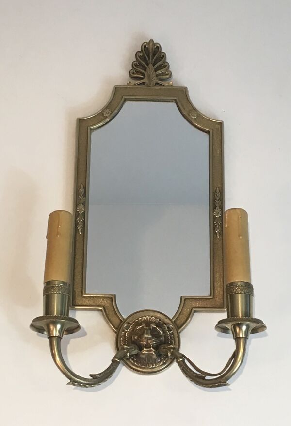 Paire d’appliques en miroir et bronze à têtes de lions 1940