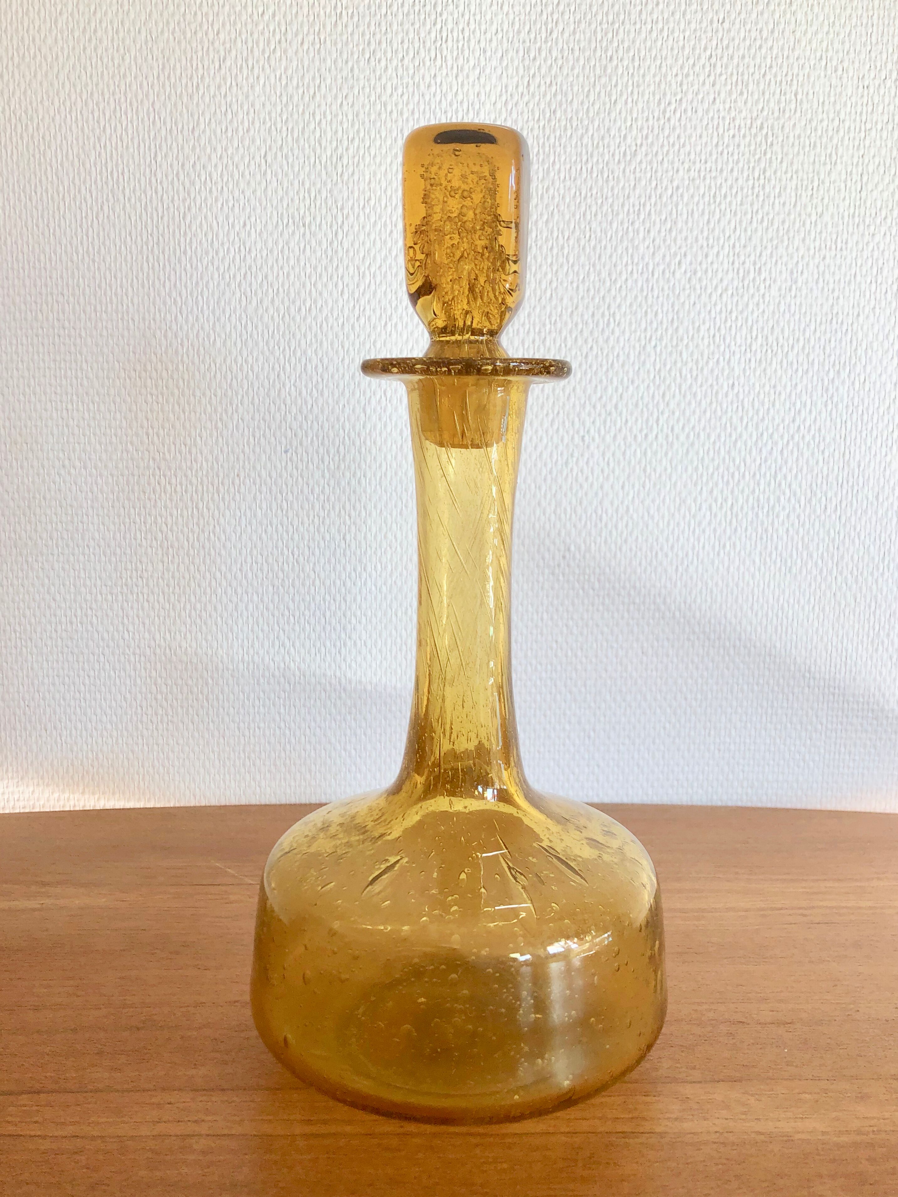 Yellow blown glass decanter