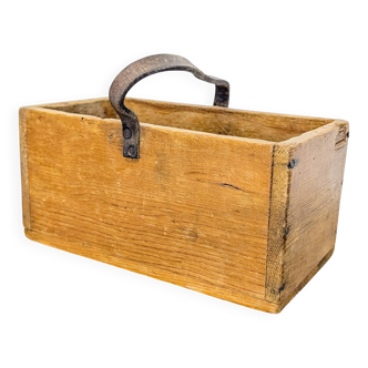 Small wooden tool holder with a leather handle.