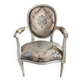 Armchair and its pouf