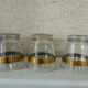 5 drinks a cocktail vintage 1950, edged gold and each Fund has a different color