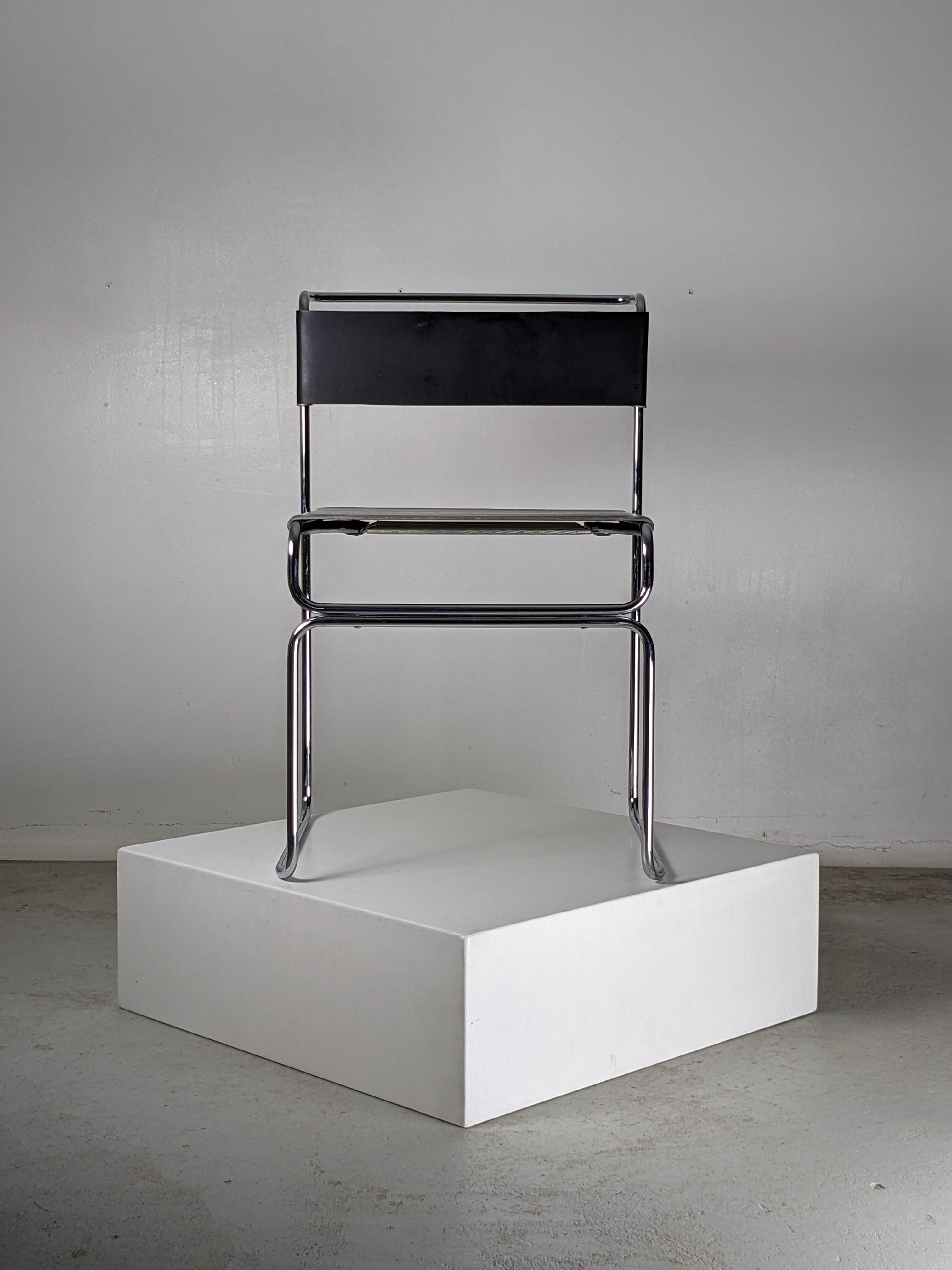 Suite of 4 chairs in chromed metal and leather by Giovanni Carini for Planula - 70s