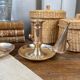 Duo of brass cellar rat candlesticks with extinguisher