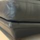 Two-seater Natuzzi sofa in navy blue leather.