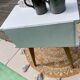 Beautiful vintage bedside table with tapered legs, Scandinavian/pop style in raw white.