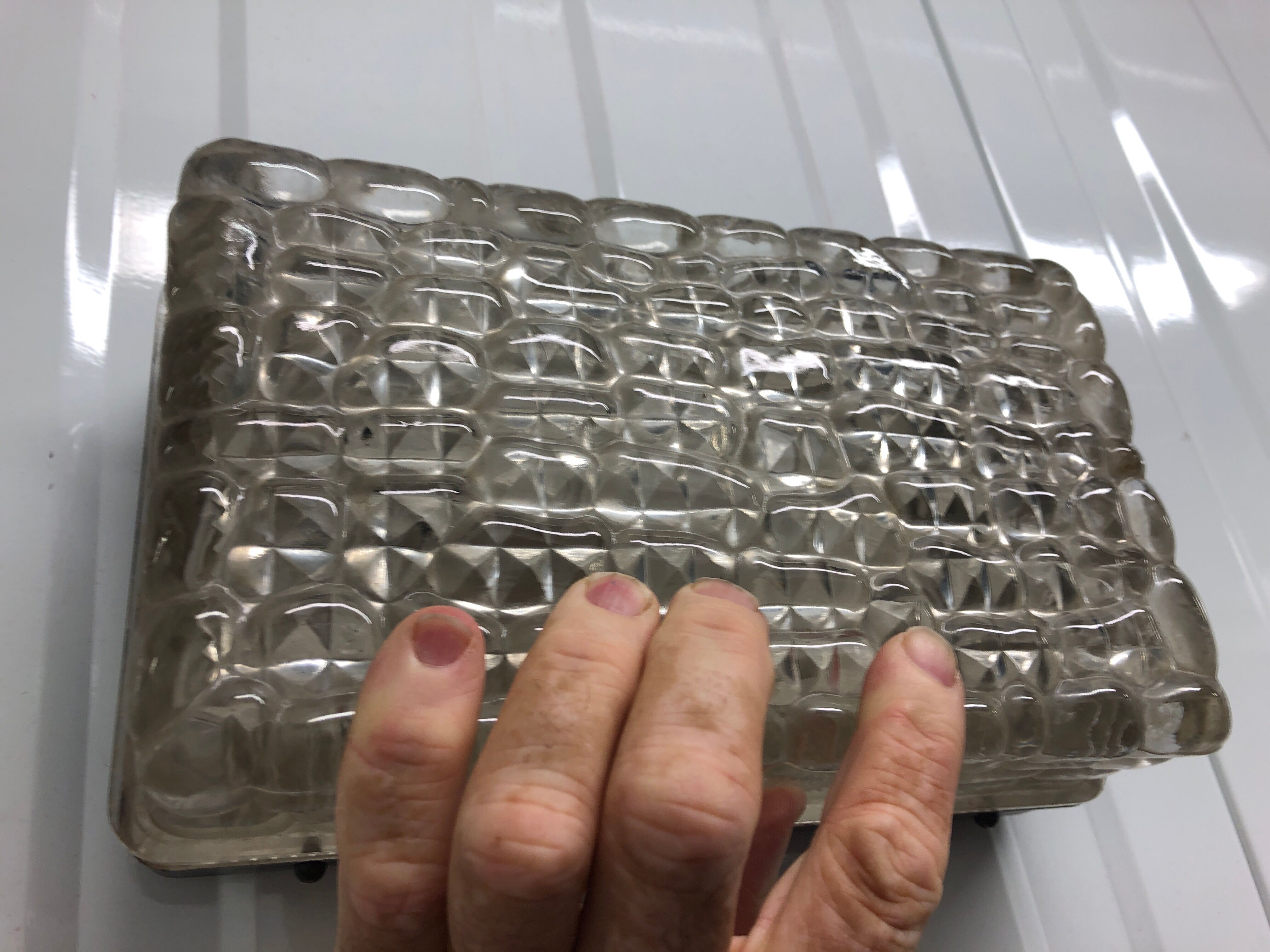 Modernist wall apply in thick moulded glass circa 1950
