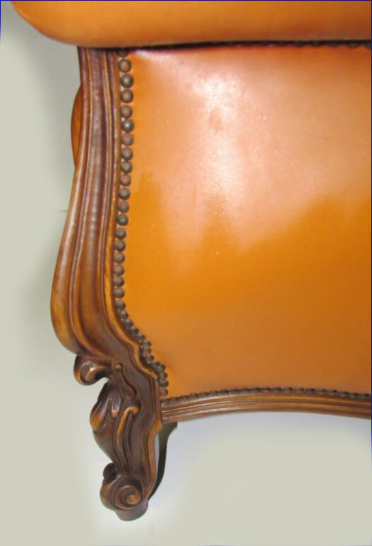 Louis XV style tawny leather chair