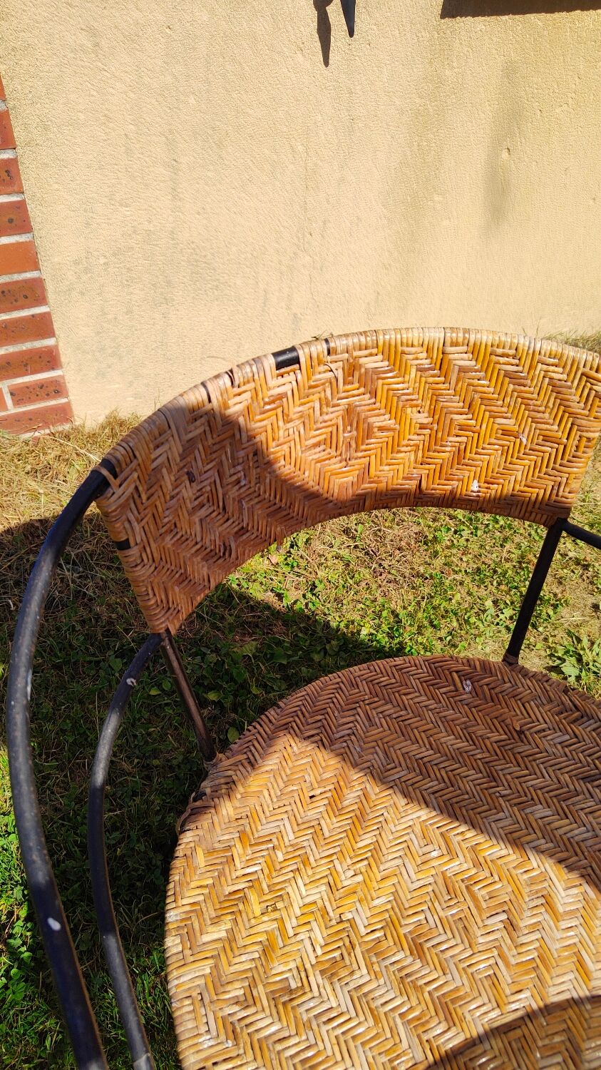 Garden table and wrought iron chair