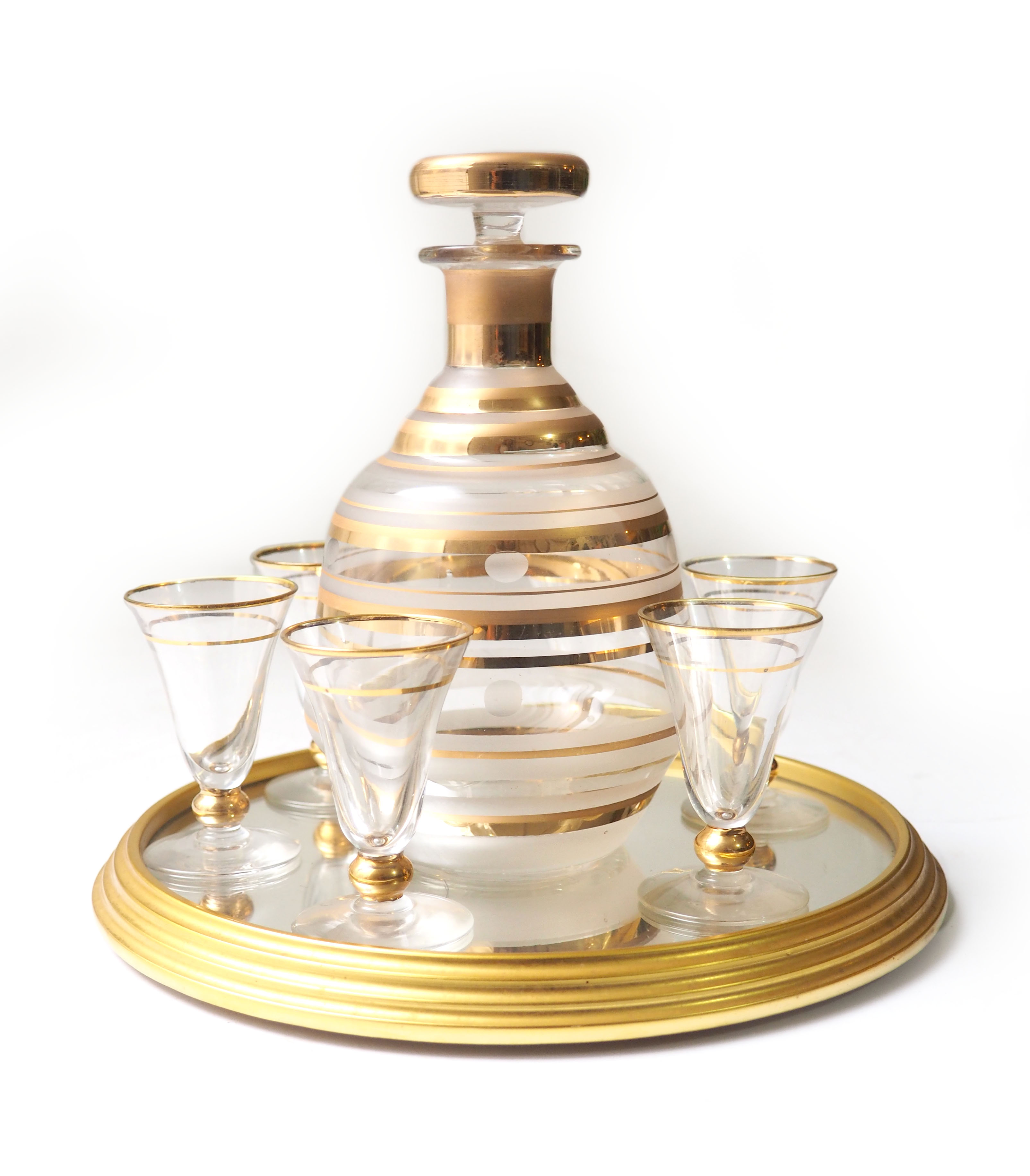 Service with cafare glasses and mirror tray