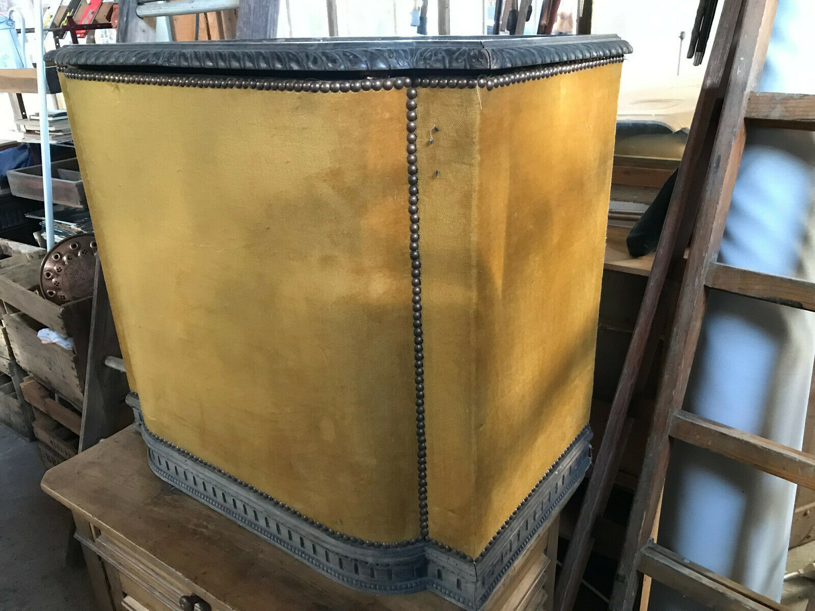 Old wooden chest and yellow velvet