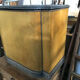 Old wooden chest and yellow velvet