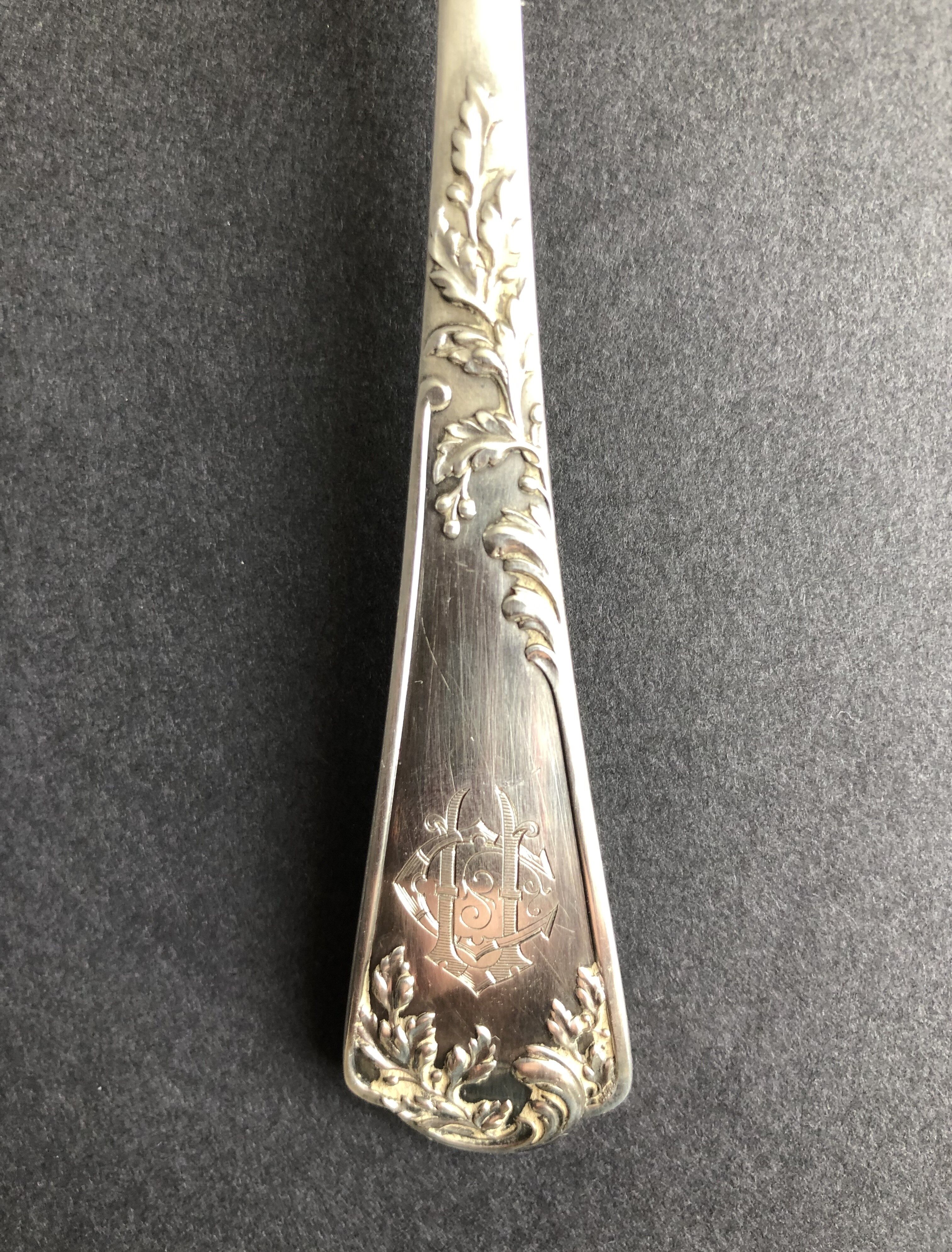 Silver sprinkling spoon