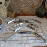 Old metal knife rests