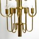 Three staged 18 arm Mid Century brass chandelier with a long brass rod