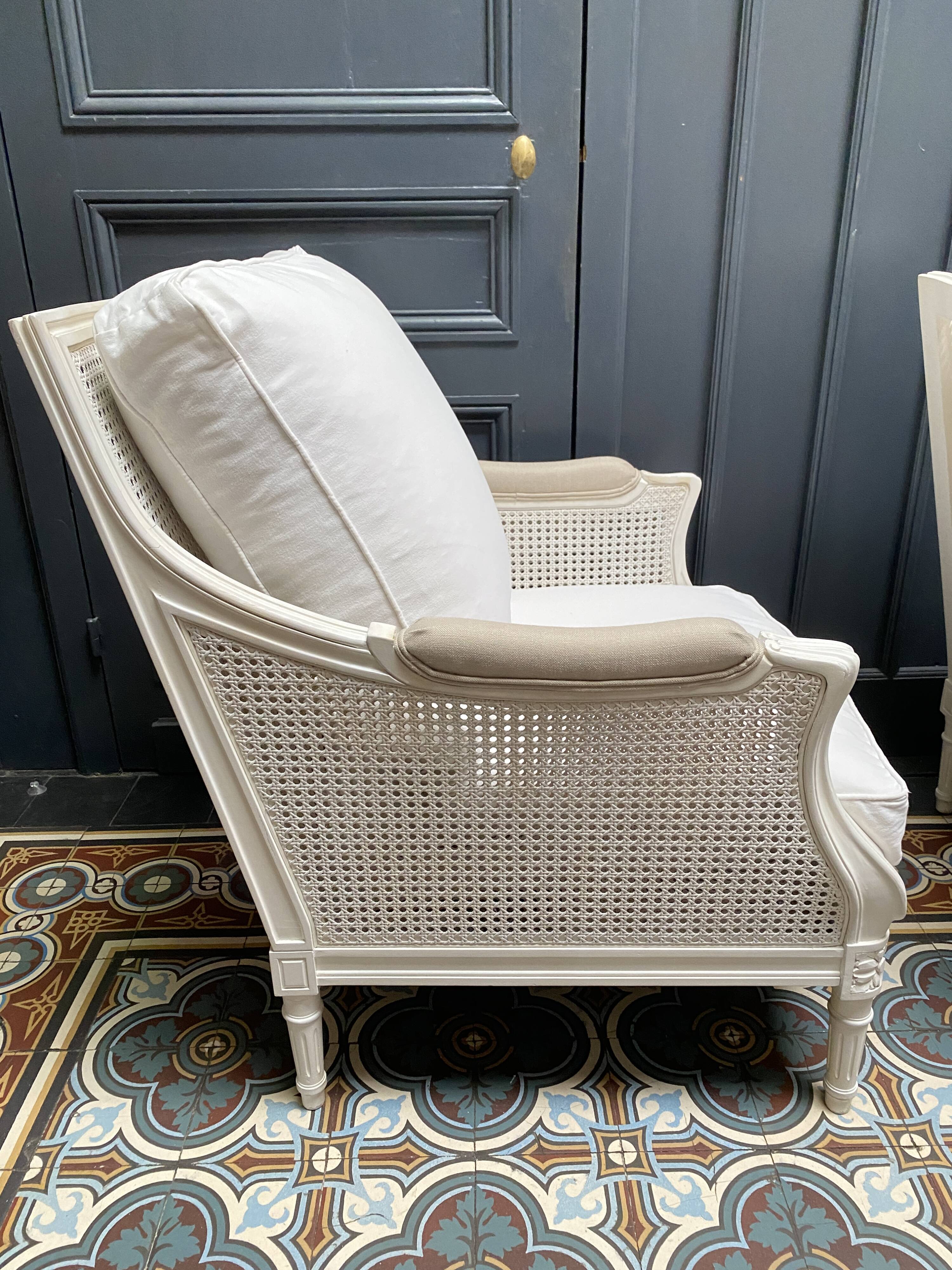 Pair of Louis XVI style caned Bergère armchairs