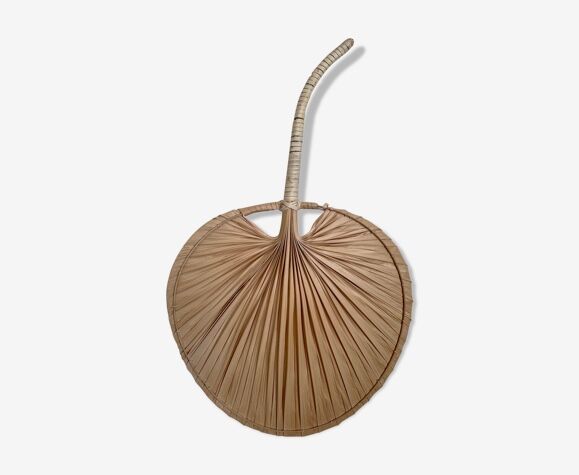 Braided palm leaf fan shape