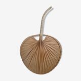 Braided palm leaf fan shape