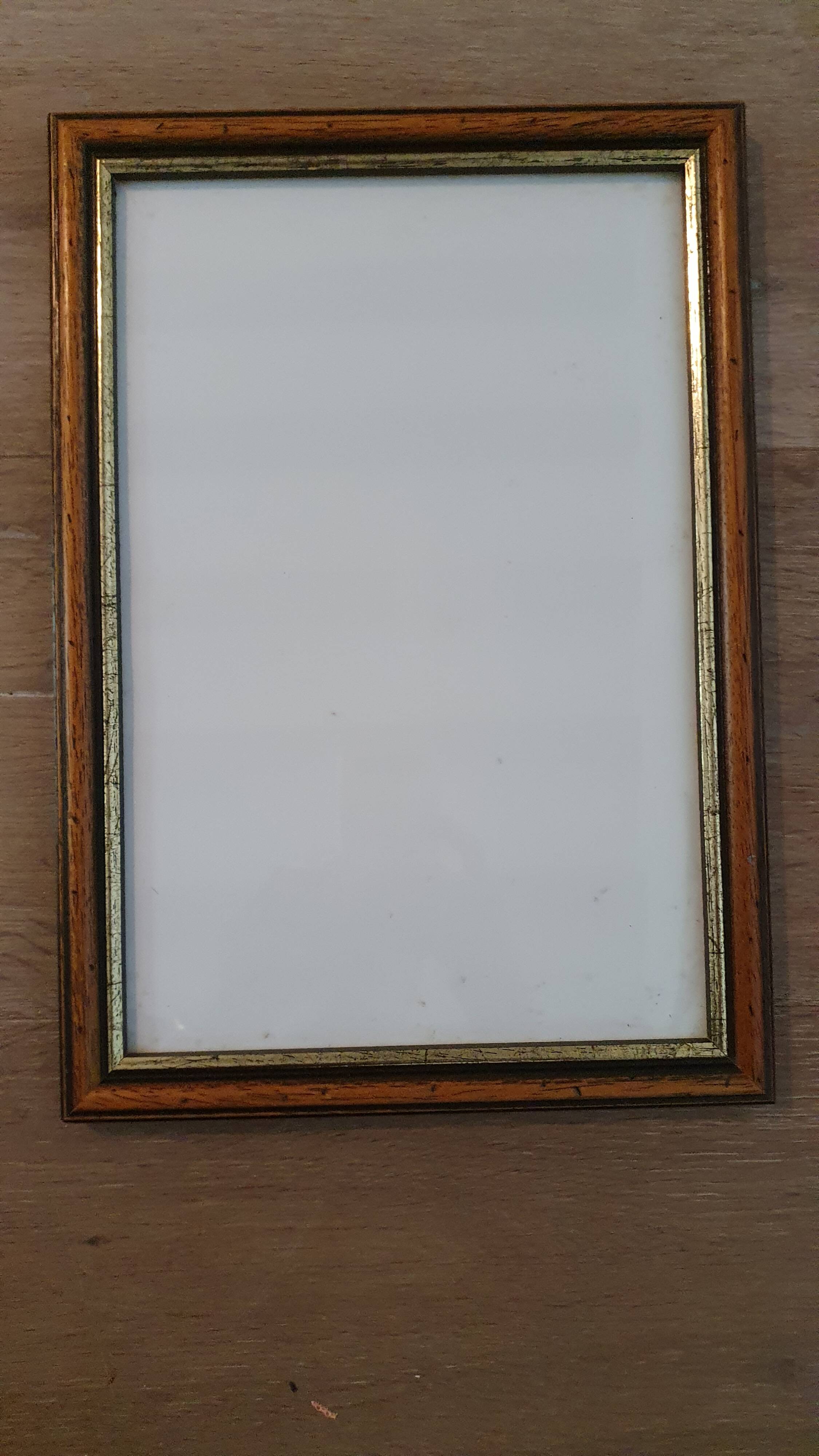 Set of 2 wooden frames with gilded edging