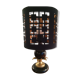 Lampe noire et or à décor de feuilles