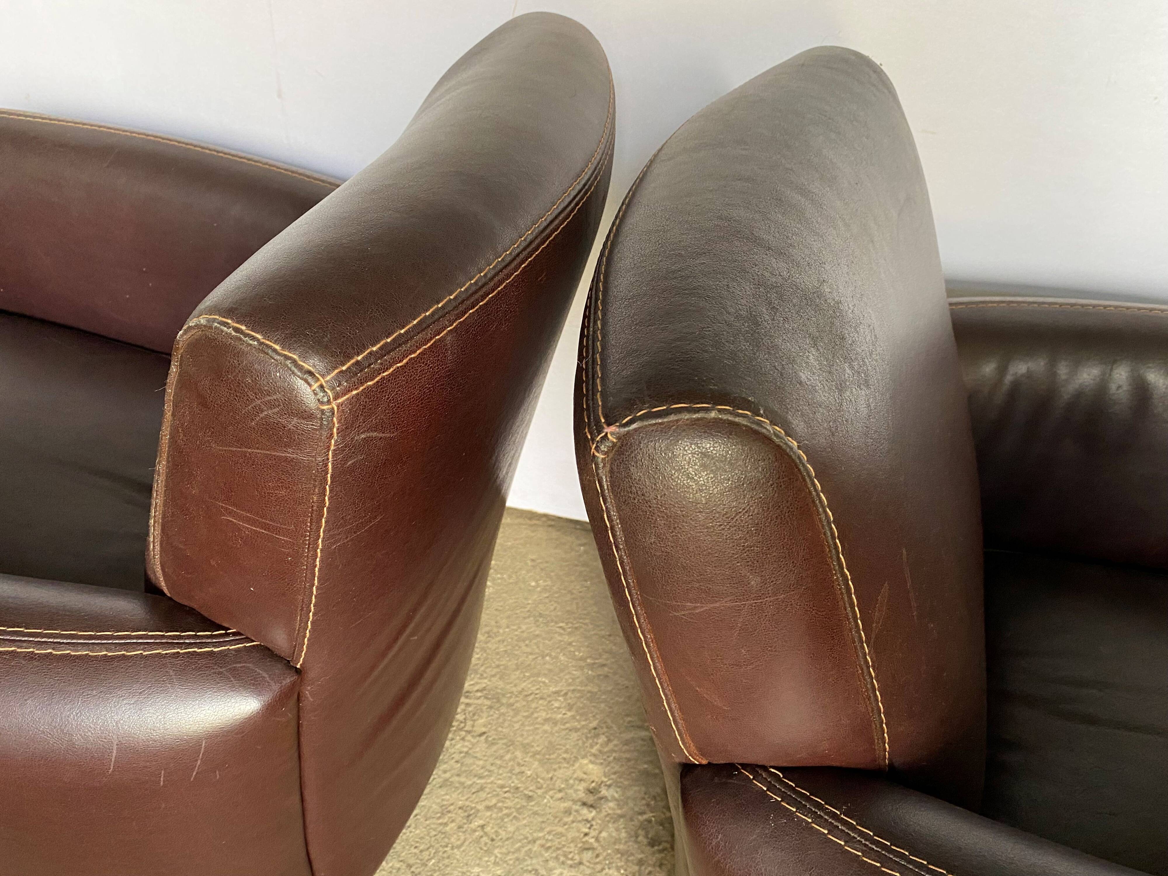 Pair of vintage brown leather club armchairs from the 70s