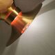 Large hanging lamp, made of brass-coloured aluminium with red and white contrast lacquer inside.