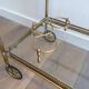 Neoclassical brass trolley with removable trays.