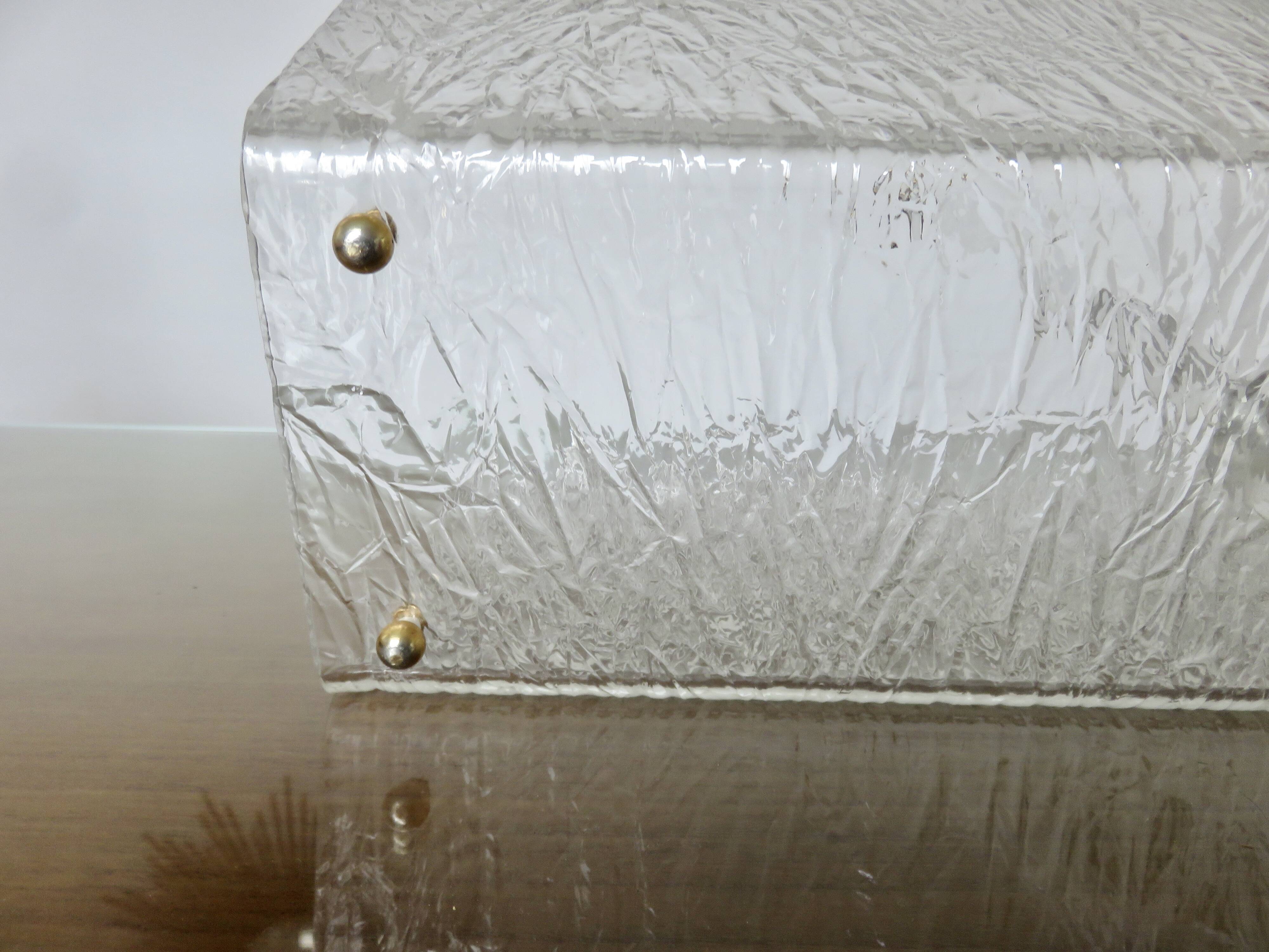 "Roche Bobois" magazine rack in lucite, plexiglass, altuglas and brass, 1970