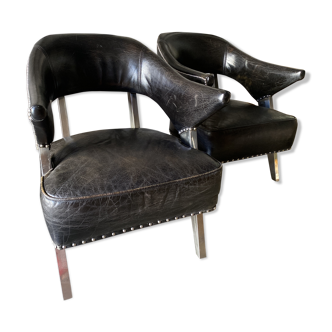 Black leather and steel armchairs