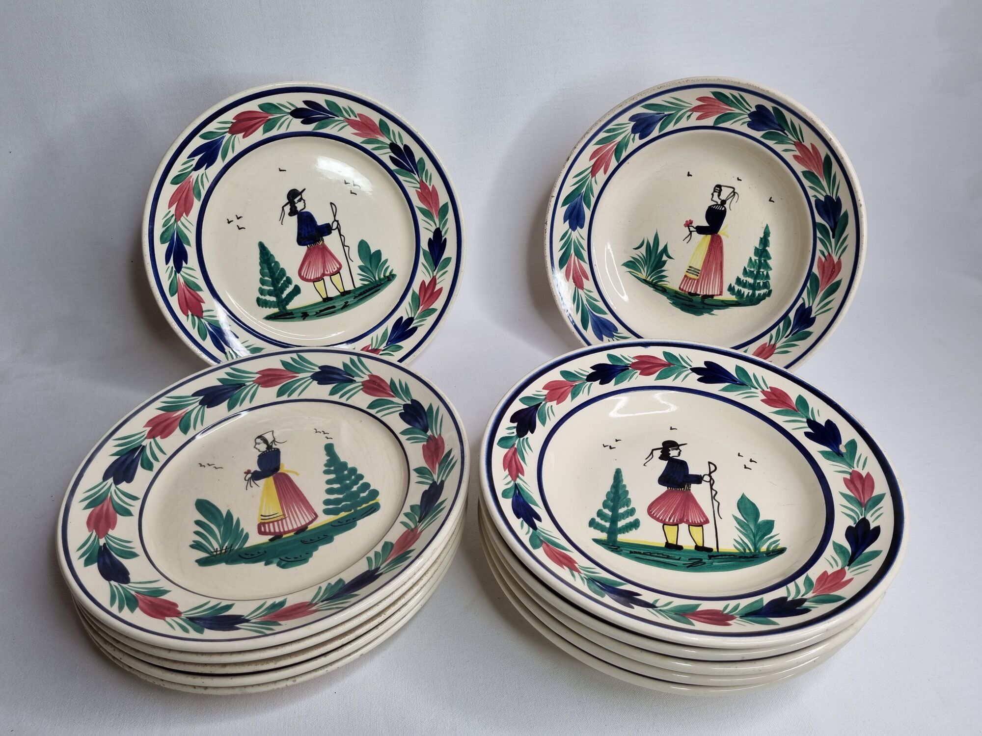 Set of 12 flat and hollow old plates decorated Breton, Henriot, Quimper