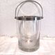 Glass and silver metal ice bucket