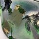Sculptural ashtray in emerald green glass