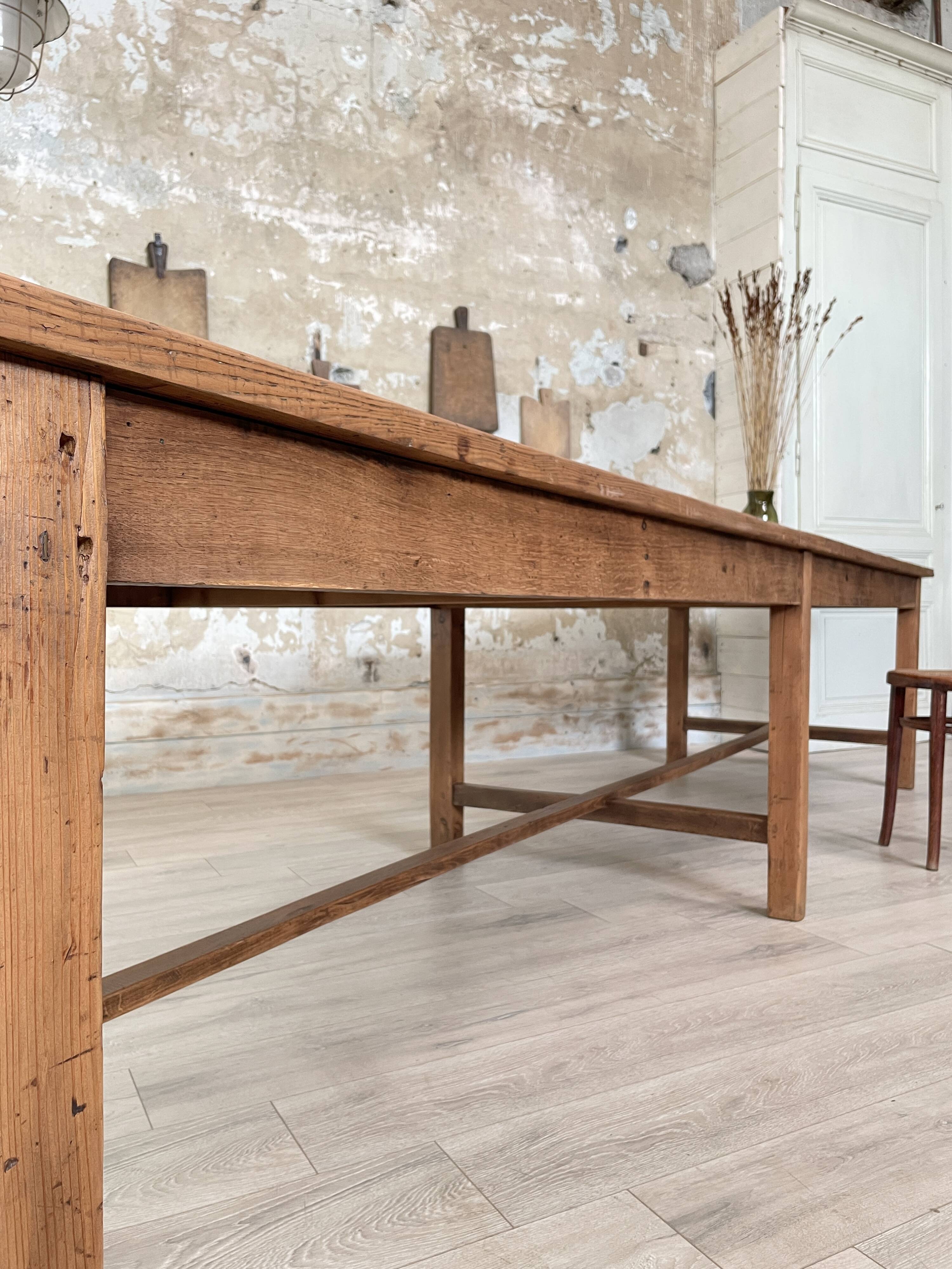 Solid wood workshop table with straight legs.