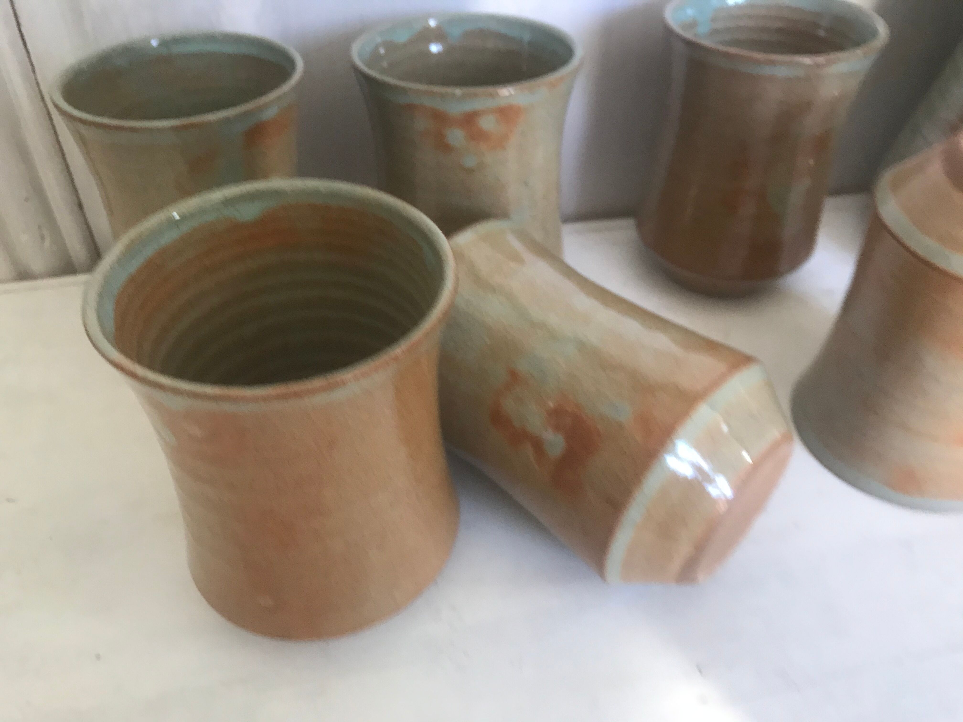 Pitcher and its vintage sandstone glasses