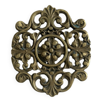 Trivet worked in brass.