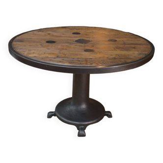 Round industrial metal and fir table