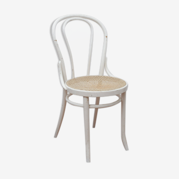 White wooden chair with cannage