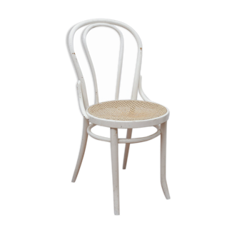 White wooden chair with cannage