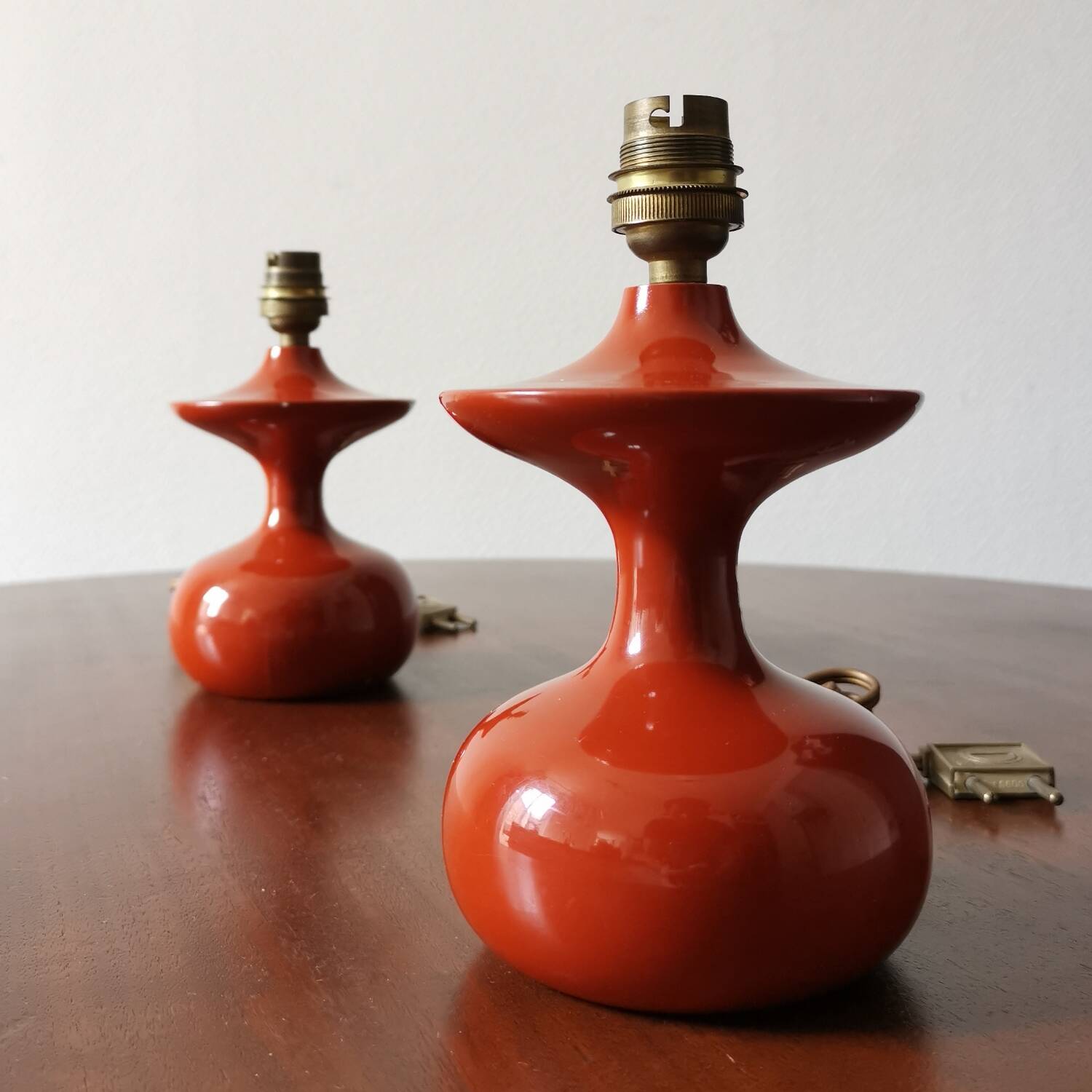 Pair of bedside lamps in lacquered turned wood