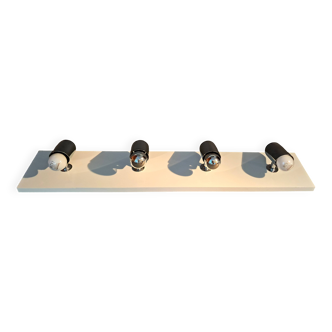 Targetti Sankey spotlights on white lacquered wooden ramp